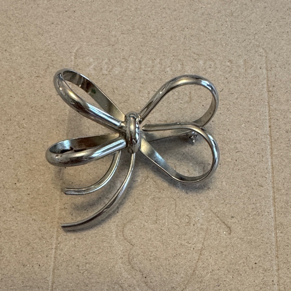 Elegant Silver Bow Brooch